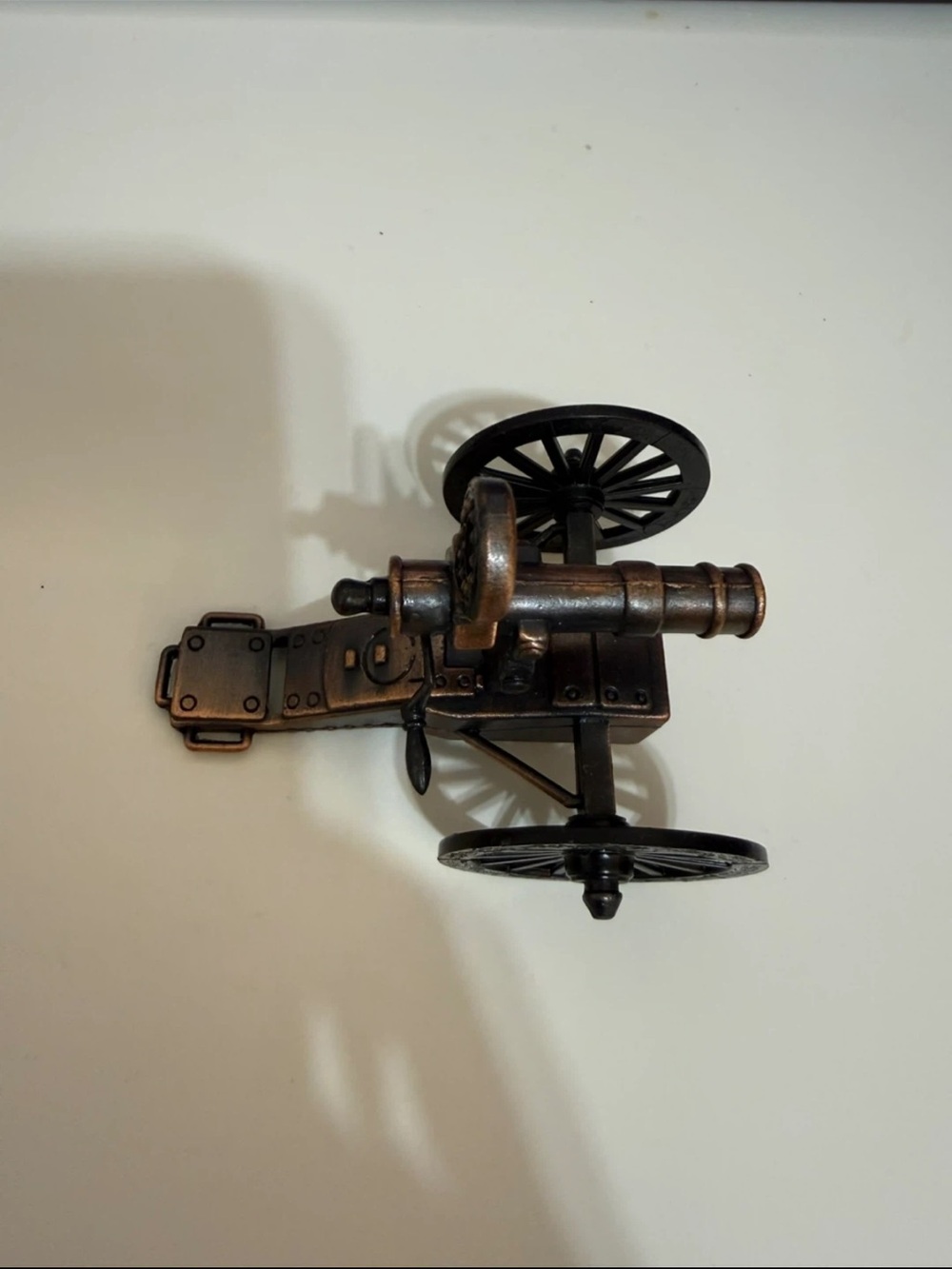 Vintage die-cast miniature pencil sharpener canon